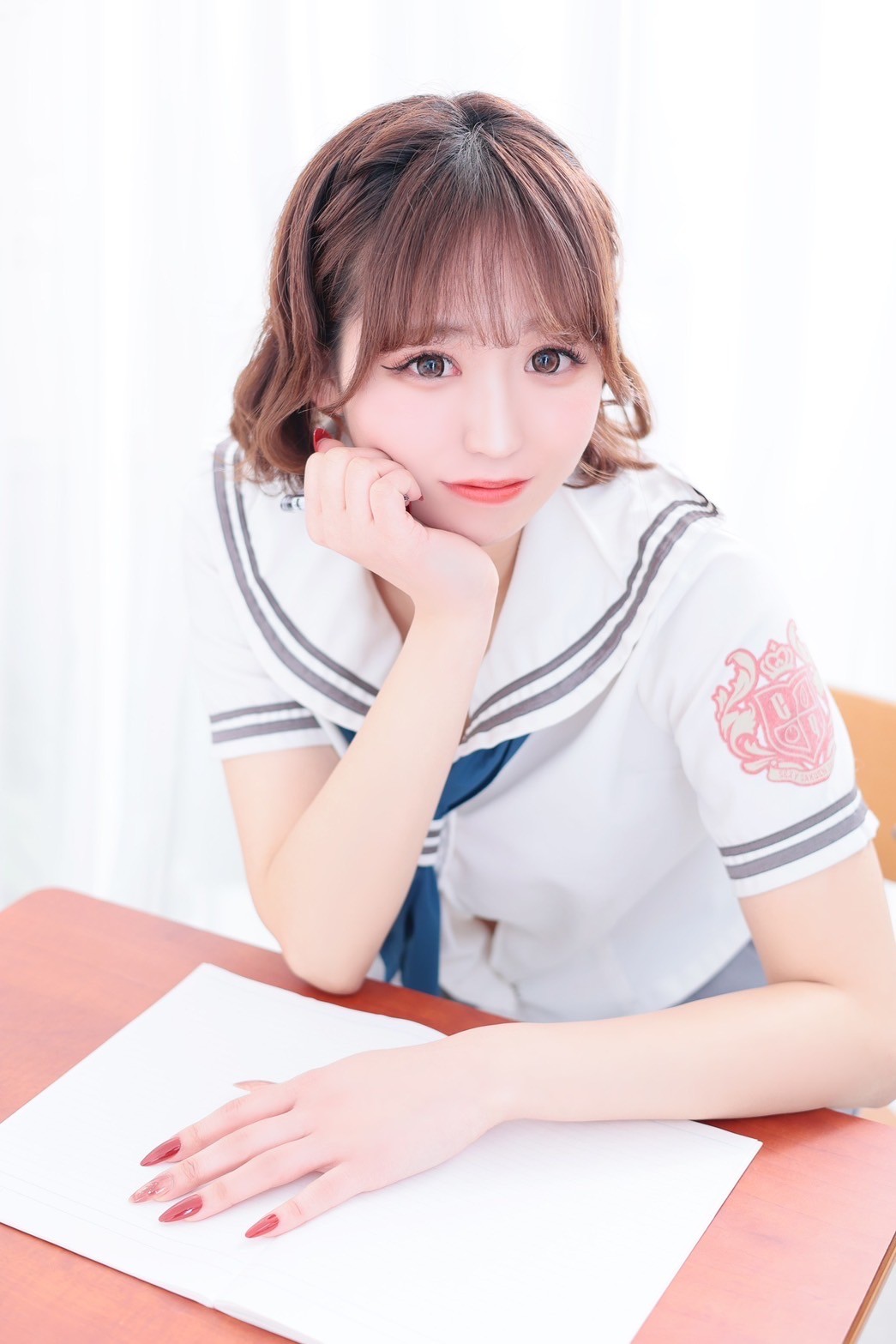 つきな
